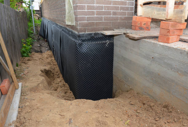 SJ Waterproofing Pros technician performing targeted Waterproofing assessment in Carrollton, GA